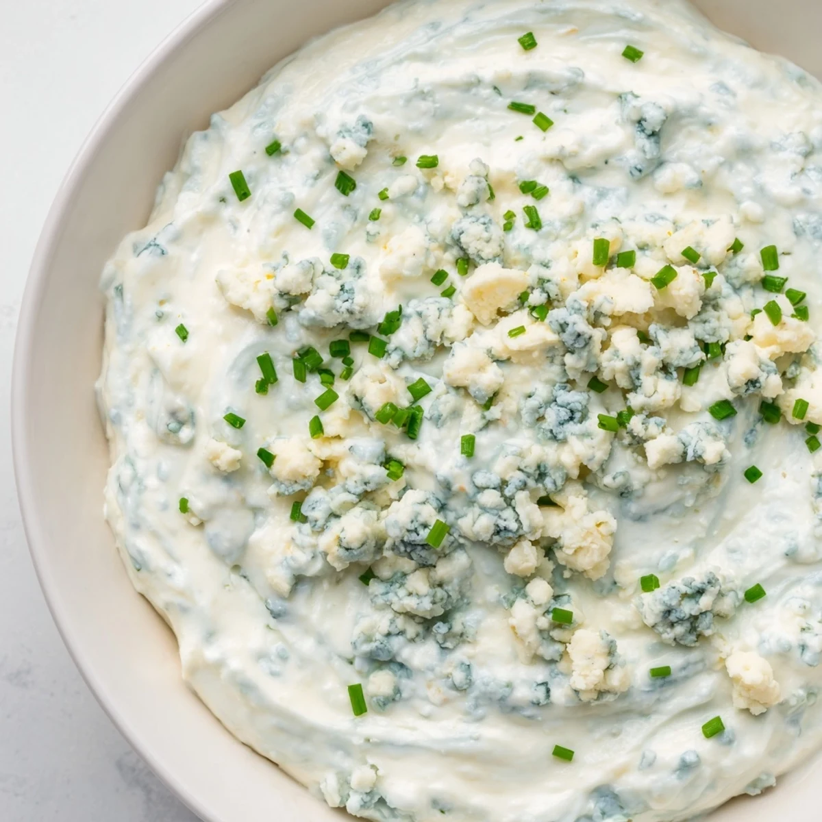 Creamy Frozen Pond Blue Dip Platter, a gorgeous appetizer with crisp chips and colorful veggies.