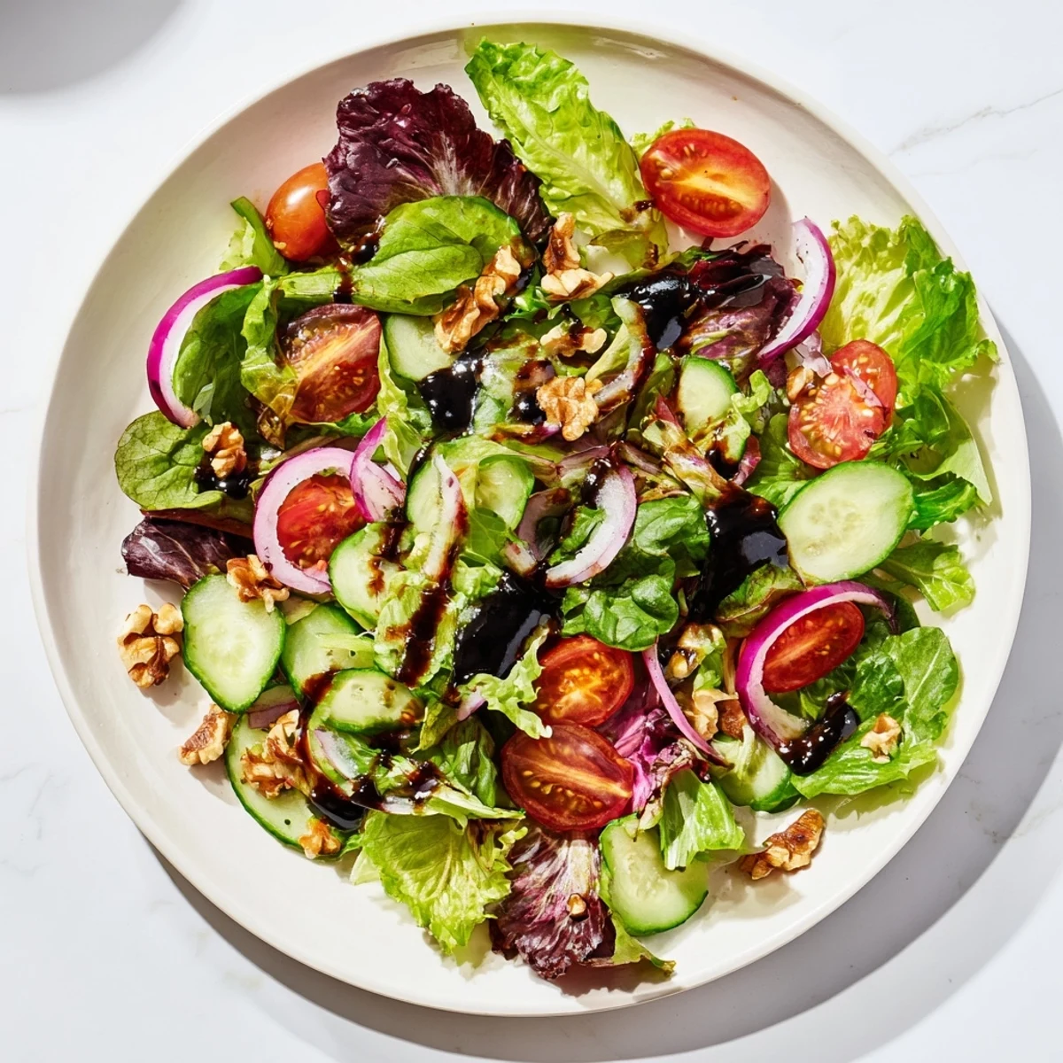 Vivid Quick Balsamic Vinegar Salad; fresh salad greens glistening with a tangy balsamic dressing.