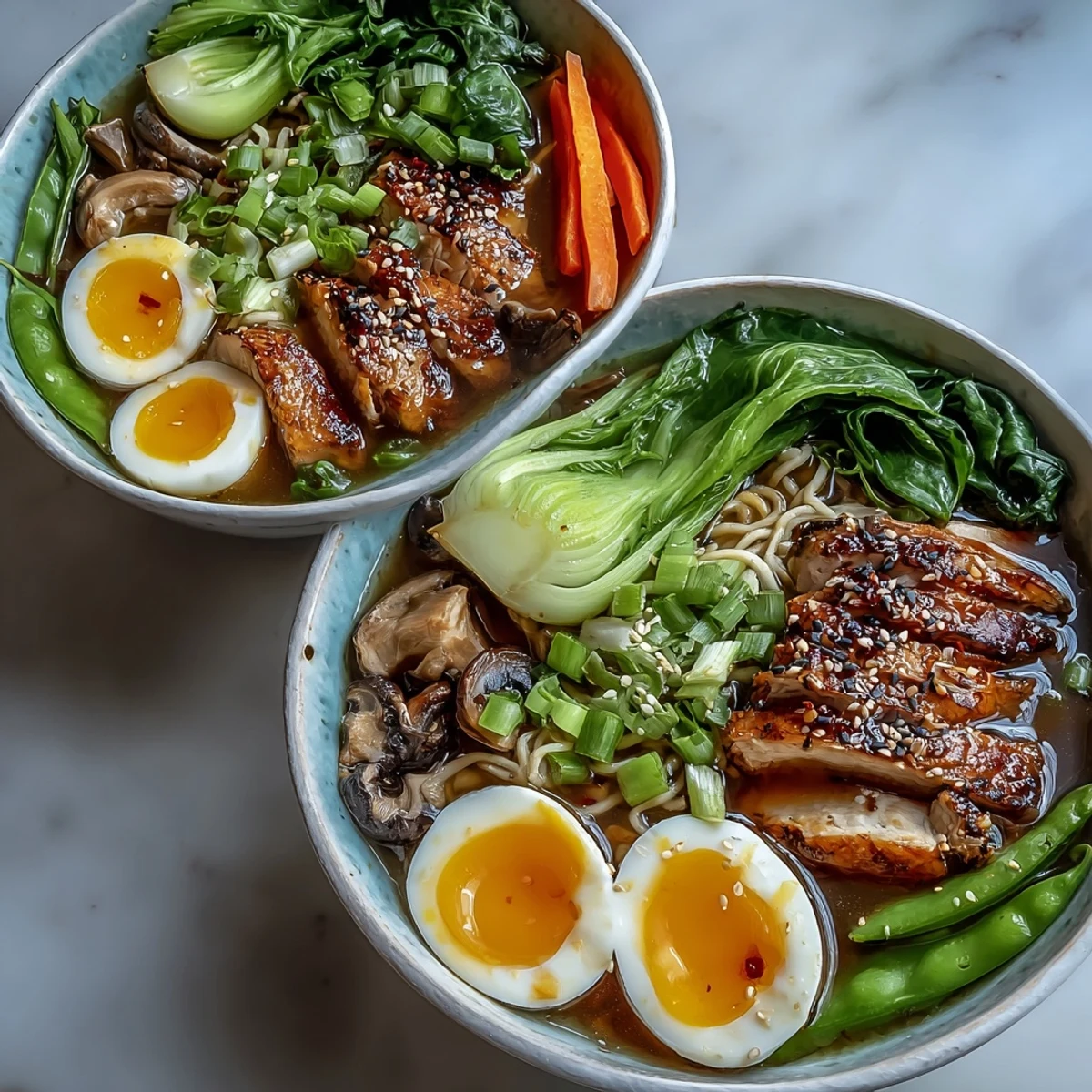 Overhead view of Healthy Miso Chicken Noodle Bowls featuring bok choy and soba.