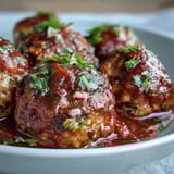 Housewarming Slow Cooker Meatballs in Marinara: Tender, savory meatballs simmered in rich tomato sauce for a comforting, crowd-pleasing dish.  
