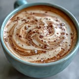Cozy Adaptogens Latte, topped with cinnamon, ready for mindful mornings.