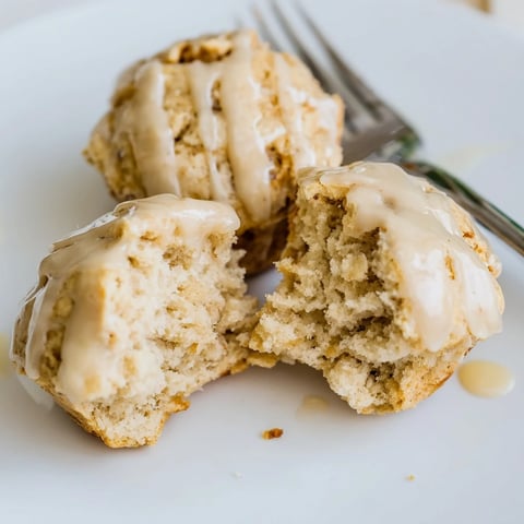 Moist coffee cream biscuit muffin bites drizzled with a luscious coffee glaze.