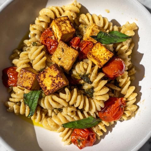 Golden-baked Vegan Baked Tofu Feta Pasta, bursting with roasted tomatoes and creamy sauce, ready to serve.