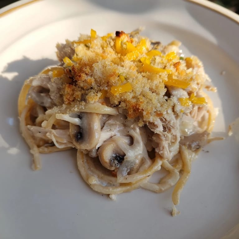 Imagine the aroma: a baked Turkey Tetrazzini filled with turkey, mushrooms, and a rich, white wine sauce.